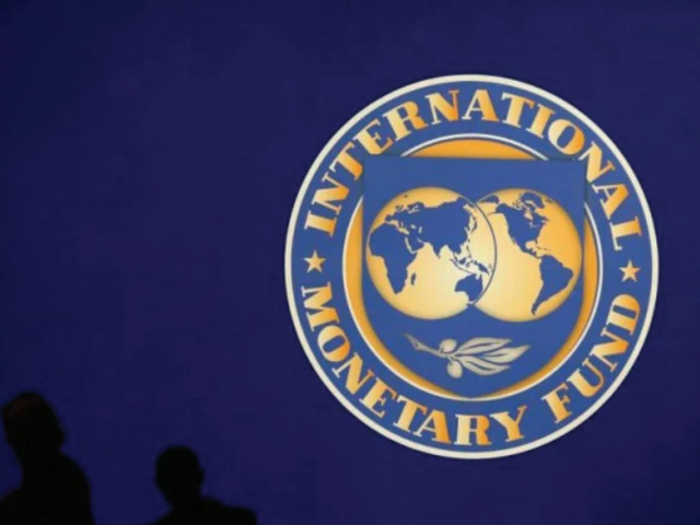 The International Monetary Fund logo and building signage, illustrating a projected regional contraction