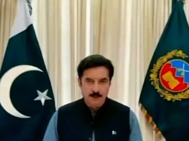 Khyber Pakhtunkhwa Governor Faisal Karim Kundi speaking at a press conference between national and provincial flags